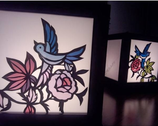 シルエットアートの小鳥とお花の作品